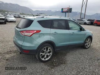 2013 Ford Escape Titanium с VIN 1FMCU9J94DUC35451, выставлен на аукционе Copart как лот 54412335 с пробегом 187 938 миль миль и Списание • Salvage title. История ставок и продаж доступна на DreamBid. Изображение 3.