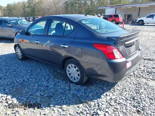 2015 Nissan Versa SV with VIN 3N1CN7AP6FL827678, listed as a IAAI auction lot 41422007 with 164,141 mi miles. Bid and sale history available at carsss.com. Image 3.