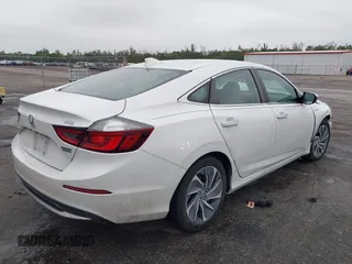 2021 Honda Insight Touring with VIN 19XZE4F94ME003177, listed as a IAAI auction lot 41377381 with 51,377 mi miles and . Bid and sale history available at carsss.com. Image 4.
