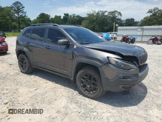 2019 Jeep Cherokee Trailhawk с VIN 1C4PJMBX5KD278692, выставлен на аукционе Copart как лот 56912285 с пробегом 110 964 миль миль и Списание • Salvage title. История ставок и продаж доступна на DreamBid. Изображение 4.