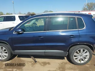 2012 Volkswagen Tiguan S with VIN WVGBV7AX2CW566981, listed as a IAAI auction lot 42069748 with 153,613 mi miles and . Bid and sale history available at DreamBid. Image 15.