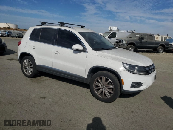 2012 Volkswagen Tiguan S with VIN WVGBV7AX3CW575463, listed as a Copart auction lot 77889064 with 168,520 mi miles and Salvage Title. Bid and sale history available at DreamBid. Image 4.