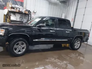 2008 Dodge Dakota Laramie with VIN 1D7HW58N58S613946, listed as a IAAI auction lot 41598426 with 114,272 mi miles. Bid and sale history available at carsss.com. Image 14.