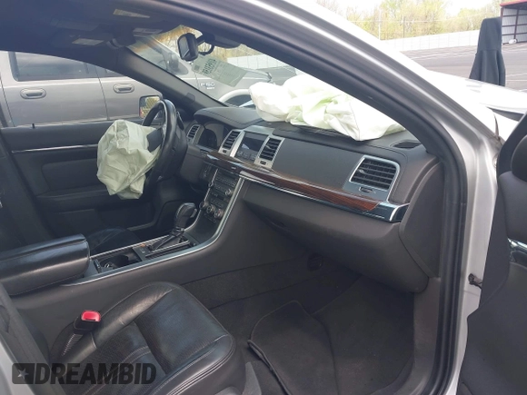 2010 Lincoln MKS с VIN 1LNHL9DR9AG616257, выставлен на аукционе IAAI как лот 41953159 с пробегом 143 308 миль миль и . История ставок и продаж доступна на DreamBid. Изображение 5.