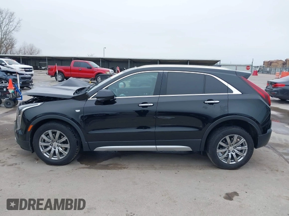 2020 Cadillac XT4 AWD Premium Luxury z VIN 1GYFZDR47LF122394, wystawiony jako IAAI lot #41703115 z przebiegiem 69 366 mil mil oraz . Historia ofert i sprzedaży dostępna na DreamBid. Obrazek 14.