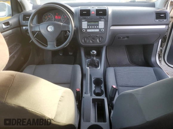2009 Volkswagen Rabbit S with VIN WVWAA71K69W130708, listed as a Copart auction lot 81105854 with 195,390 mi miles and Salvage title. Bid and sale history available at DreamBid. Image 8.