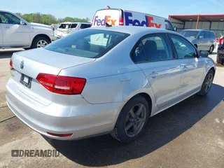 2015 Volkswagen Jetta Sedan 2.0L S with VIN 3VW2K7AJXFM423061, listed as a IAAI auction lot 42083522 with 161,028 mi miles. Bid and sale history available at carsss.com. Image 4.