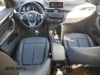 2020 BMW X1 xDrive28i z VIN WBXJG9C04L5P16314, wystawiony jako Copart lot #46709905 z przebiegiem 45 064 mil mil oraz Szkoda całkowita • Salvage title. Historia ofert i sprzedaży dostępna na DreamBid. Obrazek 8.