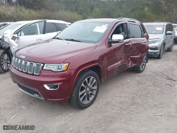 2017 Jeep Grand Cherokee Overland with VIN 1C4RJECG6HC719001, listed as a IAAI auction lot 41795517 with 103,076 mi miles. Bid and sale history available at carsss.com. Image 2.