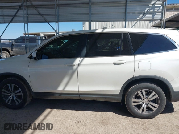 2018 Honda Pilot EX-L with VIN 5FNYF5H54JB009785, listed as a IAAI auction lot 41667784 with 67,296 mi miles. Bid and sale history available at carsss.com. Image 14.