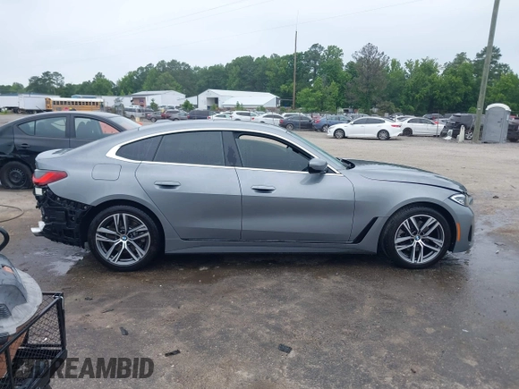 2023 BMW 4 Series 430i xDrive z VIN WBA73AV00PFP42052, wystawiony jako IAAI lot #42359167 z przebiegiem 40 883 mil mil oraz . Historia ofert i sprzedaży dostępna na DreamBid. Obrazek 14.
