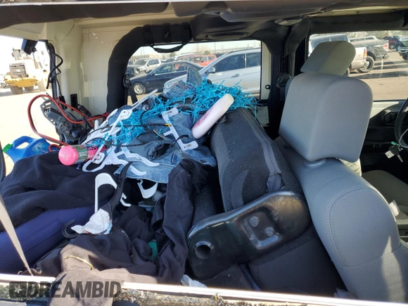 2009 Jeep Wrangler Rubicon with VIN 1J4GA64169L765933, listed as a Copart auction lot 84963104 with 107,190 mi miles and Salvage Title. Bid and sale history available at DreamBid. Image 10.