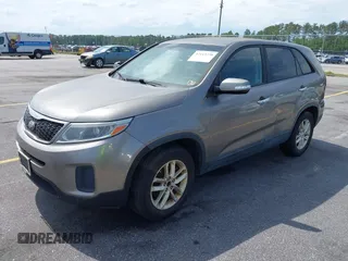 2014 Kia Sorento LX with VIN 5XYKT3A60EG486699, listed as a IAAI auction lot 42143270 with 127,190 mi miles and . Bid and sale history available at DreamBid. Image 2.