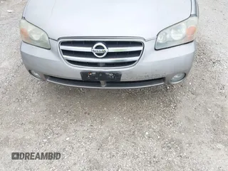 2002 Nissan Maxima GLE z VIN JN1DA31A12T000651, wystawiony jako IAAI lot #42167202 z przebiegiem Nie podano mil oraz . Historia ofert i sprzedaży dostępna na DreamBid. Obrazek 6.