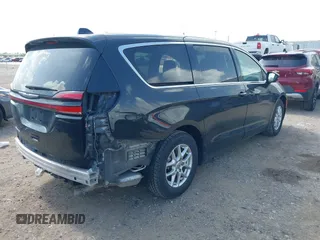 2023 Chrysler Pacifica Touring L z VIN 2C4RC1BG6PR628076, wystawiony jako IAAI lot #42553624 z przebiegiem 59 442 mil mil oraz . Historia ofert i sprzedaży dostępna na DreamBid. Obrazek 4.