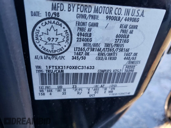 1999 Ford F-350 XL z VIN 1FTSX31F0XEC31633, wystawiony jako Copart lot #84082754 z przebiegiem 192 085 mil mil oraz Szkoda całkowita • Salvage title. Historia ofert i sprzedaży dostępna na DreamBid. Obrazek 13.