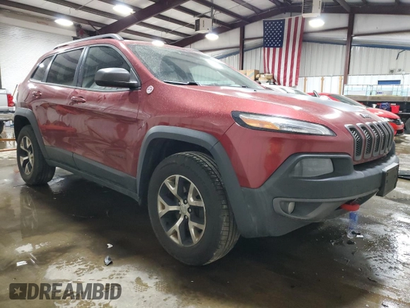 2015 Jeep Cherokee Trailhawk with VIN 1C4PJMBB8FW576765, listed as a Copart auction lot 49097925 with 299,877 mi miles and Clean Title. Bid and sale history available at DreamBid. Image 4.
