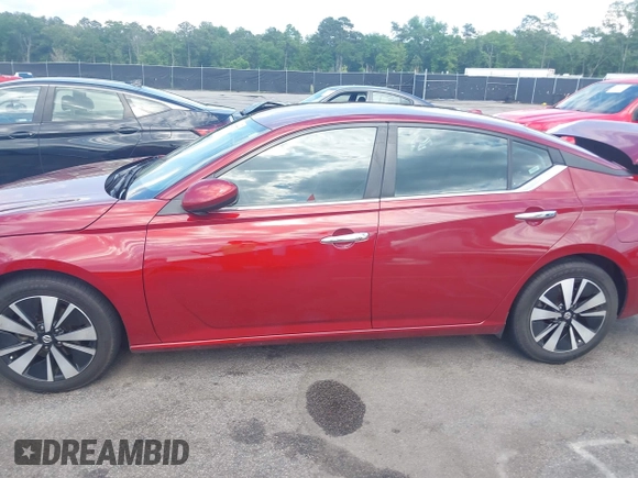 2022 Nissan Altima SV z VIN 1N4BL4DV5NN307810, wystawiony jako IAAI lot #42210773 z przebiegiem 135 459 mil mil oraz . Historia ofert i sprzedaży dostępna na DreamBid. Obrazek 14.