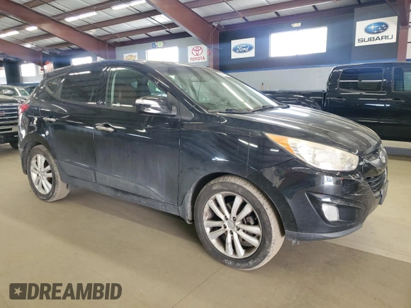 2011 Hyundai Tucson Limited with VIN KM8JUCAC2BU251936, listed as a Copart auction lot 55479205 with 110,707 mi miles and Clean Title. Bid and sale history available at DreamBid. Image 4.