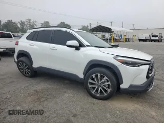 2022 Toyota Corolla Cross XLE with VIN 7MUDAAAG6NV014706, listed as a Copart auction lot 52456065 with 31,041 mi miles and Salvage title. Bid and sale history available at DreamBid. Image 4.