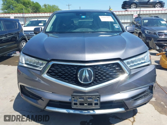 2020 Acura MDX with VIN 5J8YD4H32LL000423, listed as a IAAI auction lot 41883862 with 58,981 mi miles and . Bid and sale history available at DreamBid. Image 18.