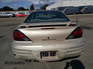 2001 Pontiac Grand Am SE z VIN 1G2NE52T91M583582, wystawiony jako Copart lot #77808974 z przebiegiem 126 219 mil mil oraz Szkoda całkowita • Salvage title. Historia ofert i sprzedaży dostępna na DreamBid. Obrazek 6.