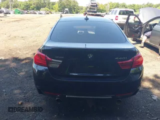 2019 BMW 4 Series 440i xDrive with VIN WBA4J7C57KBM76622, listed as a IAAI auction lot 39738945 with 79,540 mi miles and . Bid and sale history available at carsss.com. Image 16.