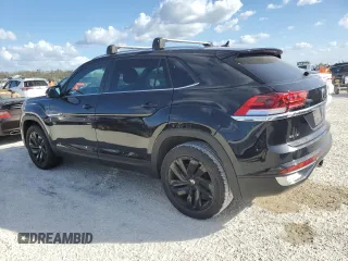 2023 Volkswagen Atlas SE z VIN 1V2WE2CA8PC214978, wystawiony jako Copart lot #77003984 z przebiegiem 6 926 mil mil oraz Nie do naprawy • Non repairable. Historia ofert i sprzedaży dostępna na DreamBid. Obrazek 2.