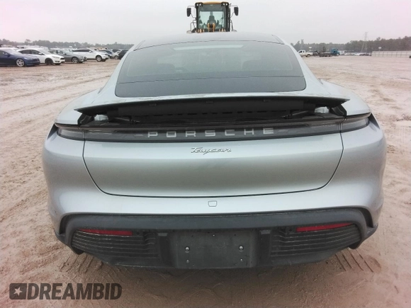 2021 Porsche Taycan z VIN WP0AA2Y14MSA18735, wystawiony jako Copart lot #72616054 z przebiegiem Nie podano mil oraz Szkoda całkowita • Salvage title. Historia ofert i sprzedaży dostępna na DreamBid. Obrazek 6.