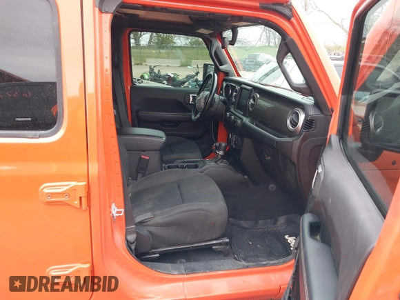 2020 Jeep Wrangler Unlimited Sahara with VIN 1C4HJXENXLW231194, listed as a IAAI auction lot 42083147 with 34,166 mi miles. Bid and sale history available at carsss.com. Image 5.