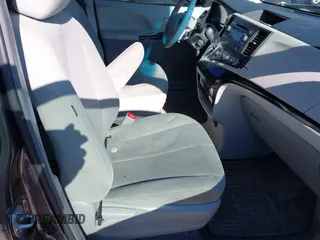 2012 Toyota Sienna with VIN 5TDZK3DC4CS228916, listed as a IAAI auction lot 41936870 with 188,227 mi miles. Bid and sale history available at carsss.com. Image 5.