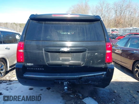2015 Chevrolet Suburban LTZ with VIN 1GNSCKKC3FR249956, listed as a IAAI auction lot 41306605 with 122,942 mi miles and . Bid and sale history available at DreamBid. Image 16.
