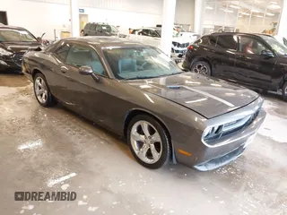 2013 Dodge Challenger SXT z VIN 2C3CDYAG9DH629189, wystawiony jako IAAI lot #41374015 z przebiegiem Nie podano mil oraz . Historia ofert i sprzedaży dostępna na DreamBid. Obrazek 1.
