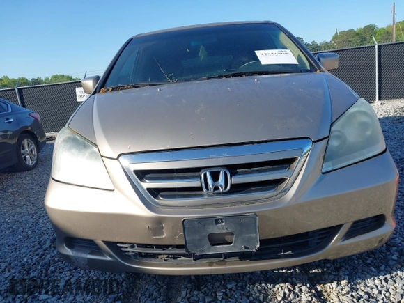 2006 Honda Odyssey EX with VIN 5FNRL38456B428213, listed as a IAAI auction lot 42036797 with 220,556 mi miles. Bid and sale history available at carsss.com. Image 6.