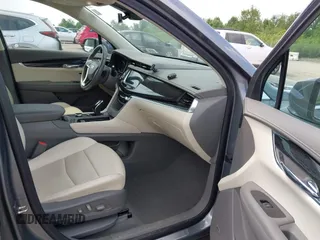 2021 Cadillac XT6 Premium Luxury with VIN 1GYKPDRS9MZ118642, listed as a IAAI auction lot 42664965 with 65,566 mi miles and . Bid and sale history available at DreamBid. Image 5.