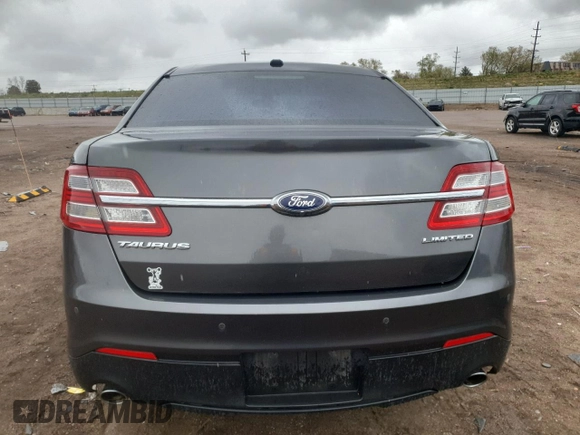 2016 Ford Taurus Limited z VIN 1FAHP2F84GG113318, wystawiony jako Copart lot #55733245 z przebiegiem 82 246 mil mil oraz Szkoda całkowita • Salvage title. Historia ofert i sprzedaży dostępna na DreamBid. Obrazek 6.