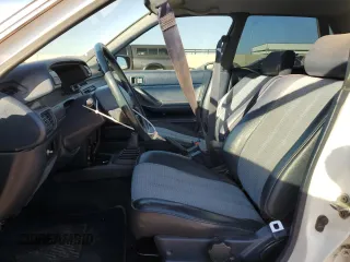 1989 Toyota Camry z VIN 4T1SV24E5KU019985, wystawiony jako Copart lot #81200104 z przebiegiem 207 103 mil mil oraz Szkoda całkowita • Salvage title. Historia ofert i sprzedaży dostępna na DreamBid. Obrazek 7.