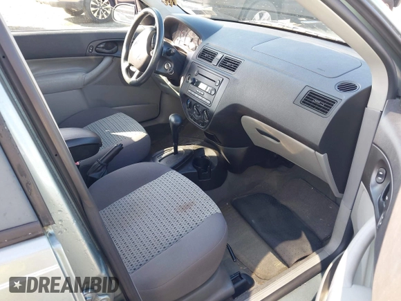 2006 Ford Focus S z VIN 1FAFP34N96W102857, wystawiony jako IAAI lot #42476971 z przebiegiem 125 744 mil mil oraz . Historia ofert i sprzedaży dostępna na DreamBid. Obrazek 5.