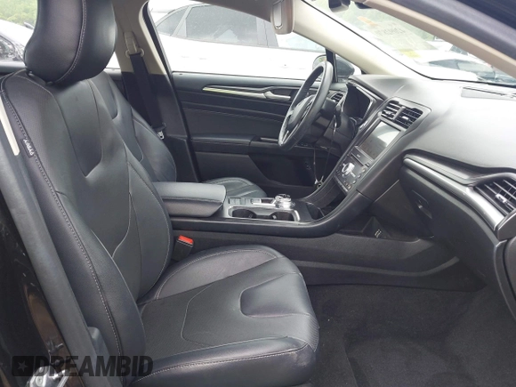 2019 Ford Fusion Titanium with VIN 3FA6P0SU1KR285161, listed as a IAAI auction lot 42092870 with 62,437 mi miles and . Bid and sale history available at DreamBid. Image 5.