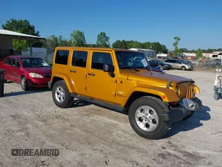 2014 Jeep Wrangler Unlimited Sahara z VIN 1C4BJWEG9EL195861, wystawiony jako IAAI lot #42187516 z przebiegiem 112 494 mil mil oraz . Historia ofert i sprzedaży dostępna na DreamBid. Obrazek 1.