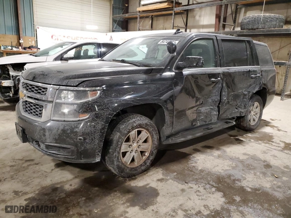 2015 Chevrolet Tahoe Commercial with VIN 1GNSK2EC4FR718793, listed as a Copart auction lot 84749724 with 122,342 mi miles and Salvage Title. Bid and sale history available at carsss.com. Image 1.