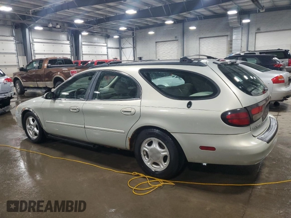 2003 Ford Taurus SE Standard with VIN 1FAFP58U43A136534, listed as a Copart auction lot 53632405 with 194,902 mi miles and Salvage Title. Bid and sale history available at carsss.com. Image 2.