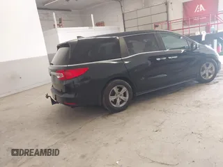2018 Honda Odyssey EX-L with VIN 5FNRL6H78JB011284, listed as a IAAI auction lot 42000640 with 154,252 mi miles and . Bid and sale history available at DreamBid. Image 4.