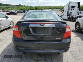 2012 Ford Fusion SEL z VIN 3FAHP0JG4CR388483, wystawiony jako Copart lot #57391805 z przebiegiem 184 665 mil mil oraz Szkoda całkowita • Salvage title. Historia ofert i sprzedaży dostępna na DreamBid. Obrazek 6.