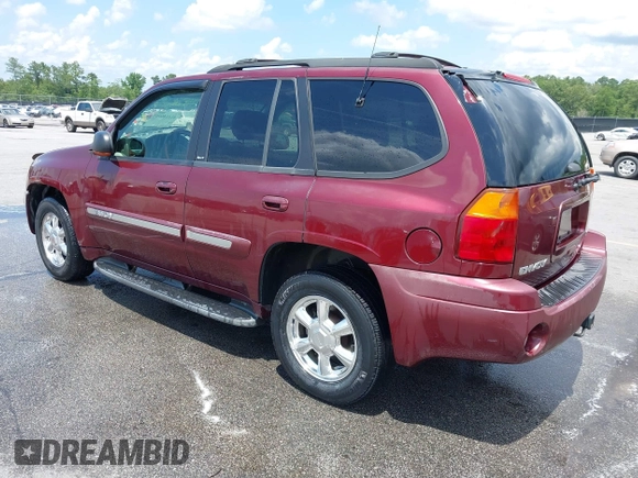 2003 GMC Envoy SLE z VIN 1GKDT13S732389048, wystawiony jako IAAI lot #42414696 z przebiegiem 215 253 mil mil oraz . Historia ofert i sprzedaży dostępna na DreamBid. Obrazek 3.