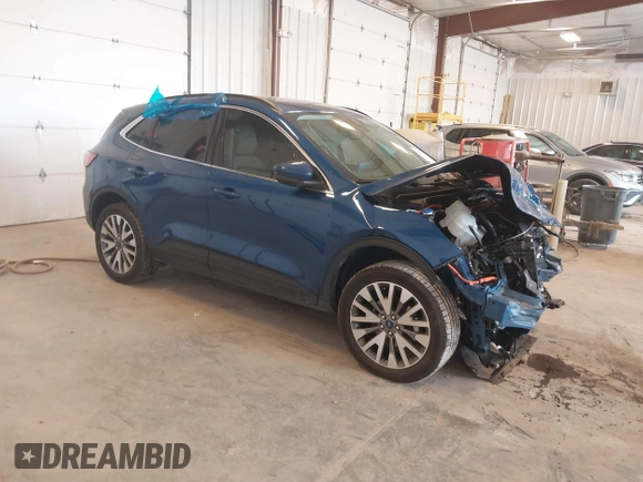 2022 Ford Escape Titanium Hybrid z VIN 1FMCU9DZ9NUA38627, wystawiony jako IAAI lot #42288647 z przebiegiem 54 802 mil mil oraz . Historia ofert i sprzedaży dostępna na DreamBid. Obrazek 1.