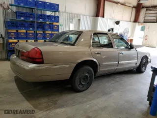 2003 Mercury Grand Marquis GS Convenience with VIN 2MEFM74W43X706057, listed as a Copart auction lot 65842884 with 215,829 mi miles and Salvage Title. Bid and sale history available at carsss.com. Image 3.