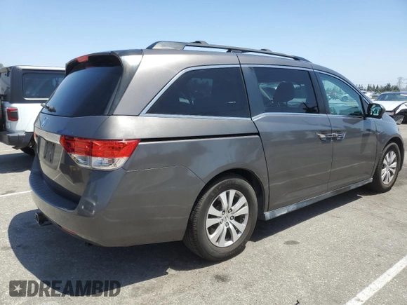 2014 Honda Odyssey EX-L with VIN 5FNRL5H62EB021297, listed as a Copart auction lot 57177375 with 206,641 mi miles and Clean title. Bid and sale history available at DreamBid. Image 3.