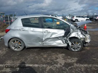 2014 Toyota Yaris L with VIN JTDKTUD33ED582669, listed as a IAAI auction lot 41573696 with Not Provided miles and . Bid and sale history available at DreamBid. Image 13.
