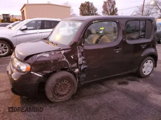 2011 Nissan Cube S z VIN JN8AZ2KRXBT214209, wystawiony jako Copart lot #79737184 z przebiegiem 102 360 mil mil oraz Szkody całkowita. Historia ofert i sprzedaży dostępna na DreamBid. Obrazek 1.